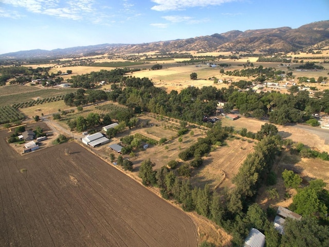 bird's eye view featuring a mountain view and a rural view