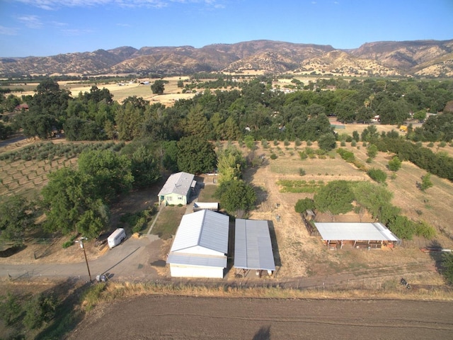 bird's eye view featuring a mountain view and a rural view
