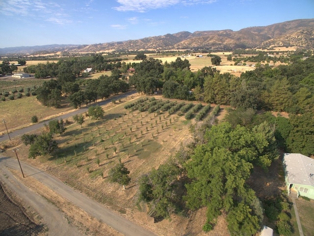 aerial view featuring a rural view and a mountain view