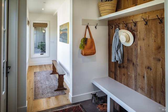 mudroom with hardwood / wood-style floors