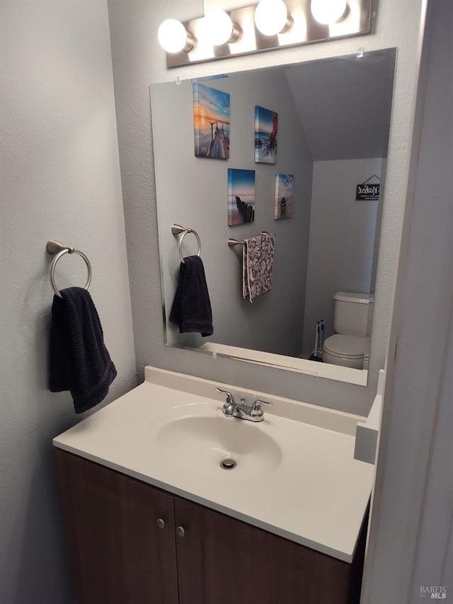 1142 Pear Tree Ln, Napa, CA 94558 - half bathroom featuring vanity and toilet