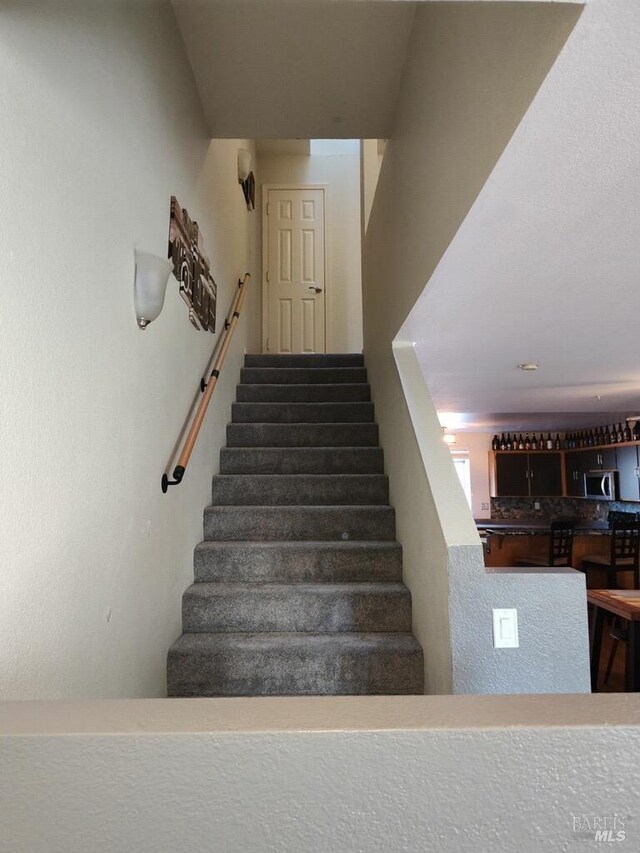 1142 Pear Tree Ln, Napa, CA 94558 - stairway featuring bar