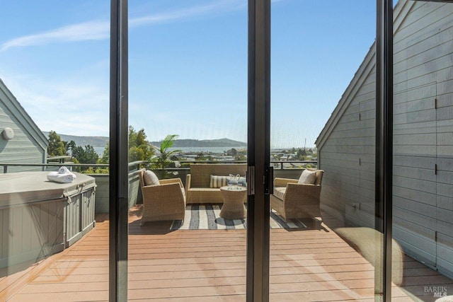 exterior space with outdoor lounge area and a mountain view