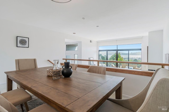 dining area with a mountain view