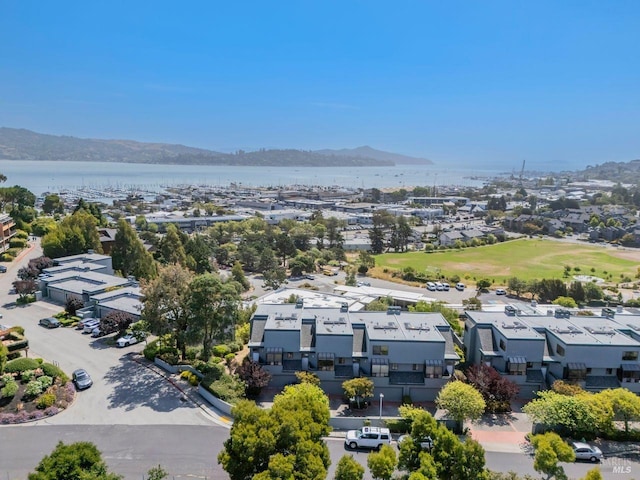 bird's eye view with a water and mountain view