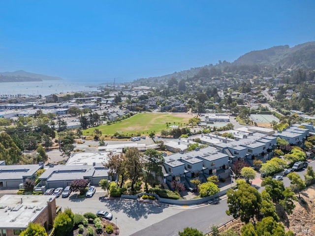 birds eye view of property with a mountain view