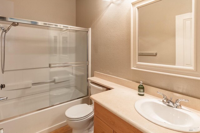 laundry area with stacked washer and dryer and light carpet