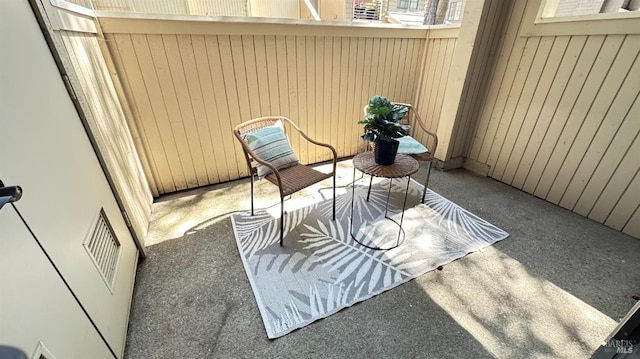 balcony featuring a patio area and visible vents