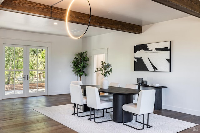 dining space with beam ceiling, dark hardwood / wood-style floors, and french doors