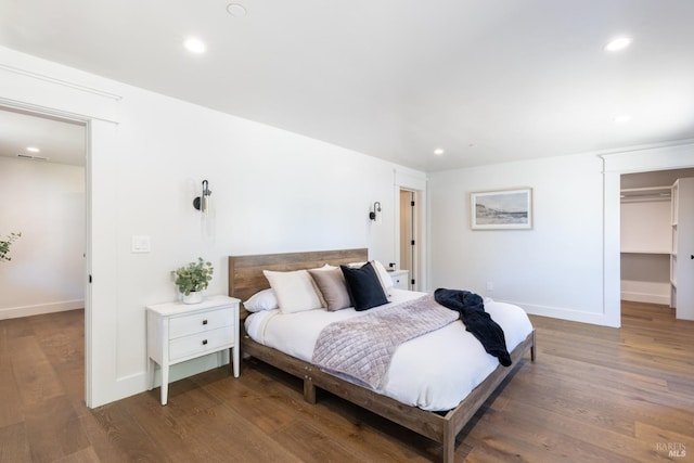 bedroom featuring hardwood / wood-style flooring