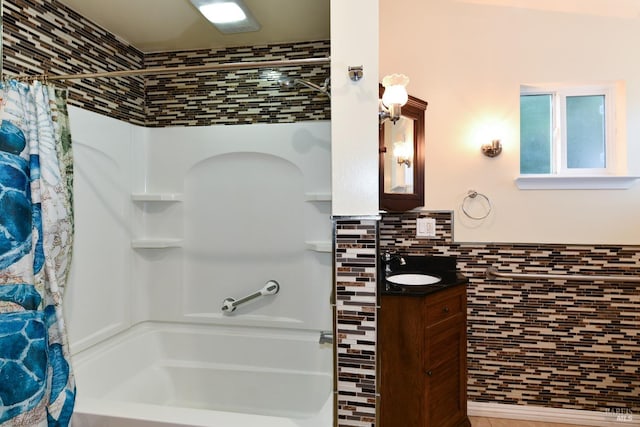 bathroom with sink and shower / bath combination with curtain