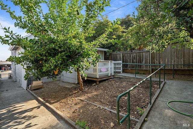 view of yard featuring a deck