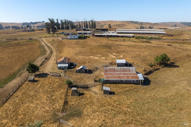 bird's eye view with a mountain view and a rural view