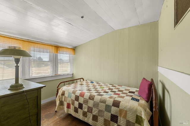 bedroom featuring wood finished floors
