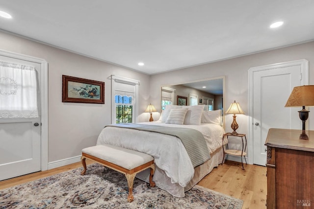 bedroom featuring light hardwood / wood-style flooring