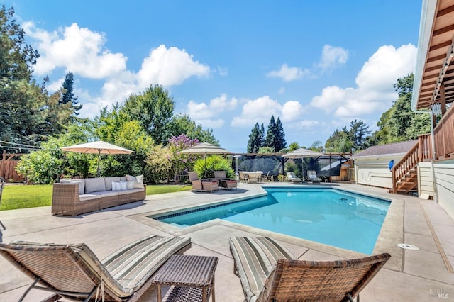 view of pool featuring a patio and an outdoor hangout area