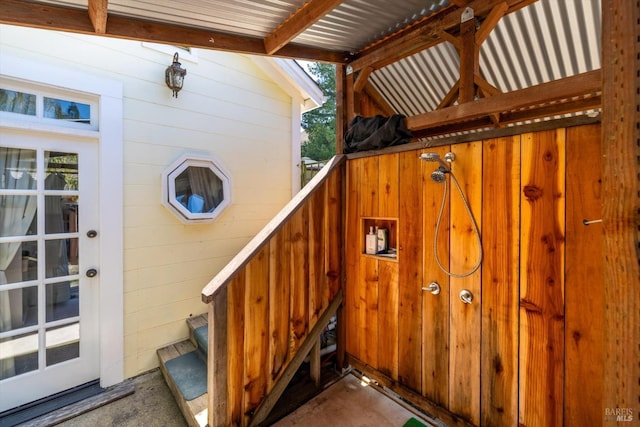 exterior details with beamed ceiling and wooden walls