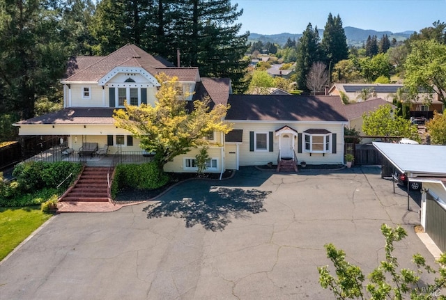 view of front of home with a mountain view