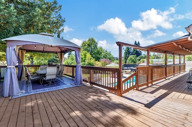 wooden terrace with a gazebo