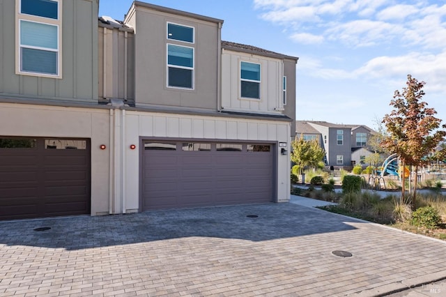 view of front of property with a garage