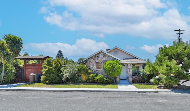 14090 Pine St, Walnut Grove, CA 95690 - view of property hidden behind natural elements with stone siding