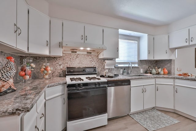 14090 Pine St, Walnut Grove, CA 95690 - kitchen featuring dishwasher, white gas range oven, under cabinet range hood, light wood-style flooring, and white cabinets