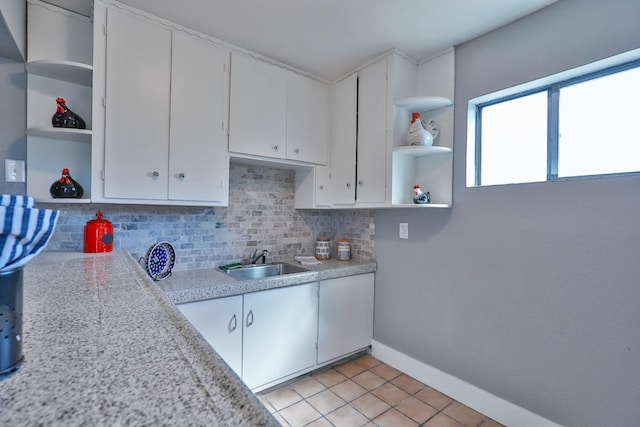 14090 Pine St, Walnut Grove, CA 95690 - kitchen with open shelves, light countertops, and backsplash