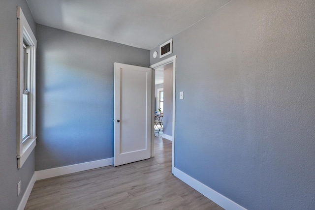 14090 Pine St, Walnut Grove, CA 95690 - spare room featuring baseboards and wood finished floors