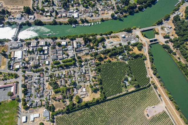 14090 Pine St, Walnut Grove, CA 95690 - aerial view of property's location with a nearby body of water and rows of crops