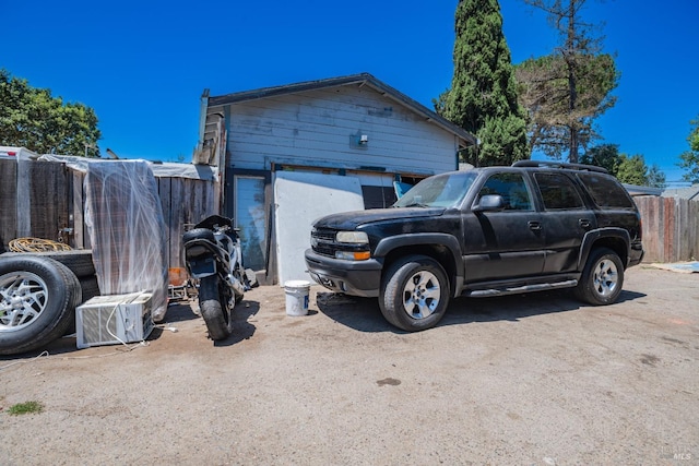 view of property exterior featuring a garage