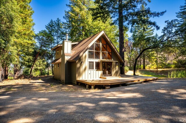 exterior space featuring a wooden deck