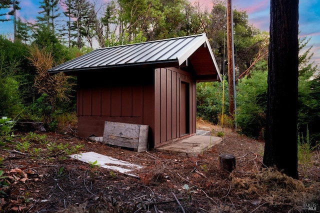 view of outdoor structure at dusk