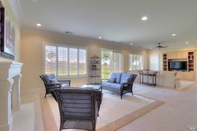 living room with ornamental molding, light tile patterned floors, built in features, and ceiling fan