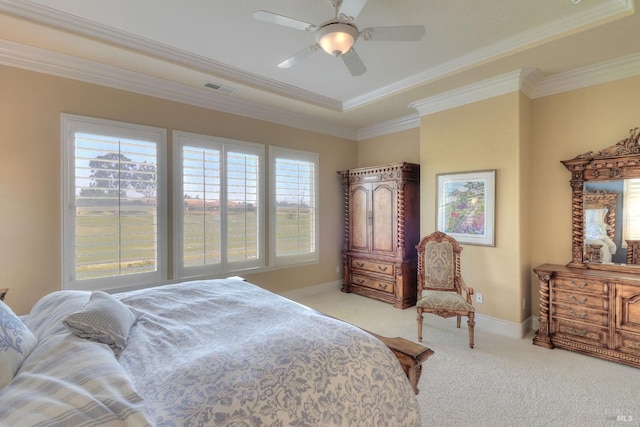 bedroom with light carpet, ornamental molding, and ceiling fan