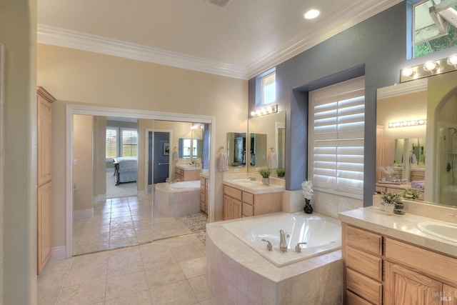 bathroom with vanity, crown molding, and tile patterned floors