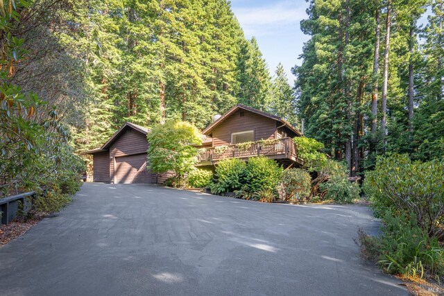 view of front of home with a wooden deck