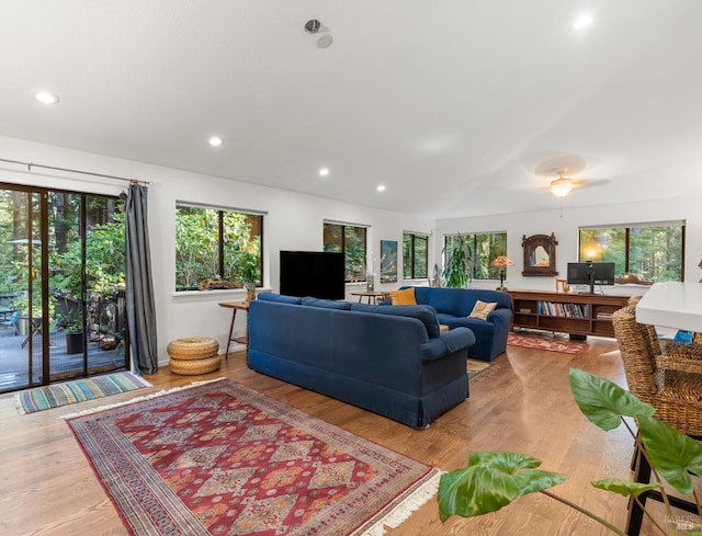 living area featuring recessed lighting and light wood-style floors