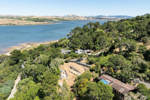 bird's eye view with a water and mountain view