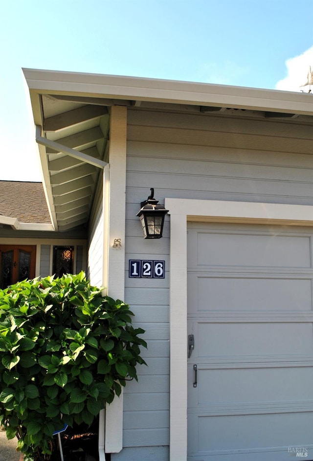 exterior space with a garage