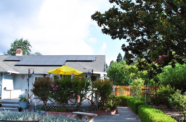 exterior space featuring solar panels