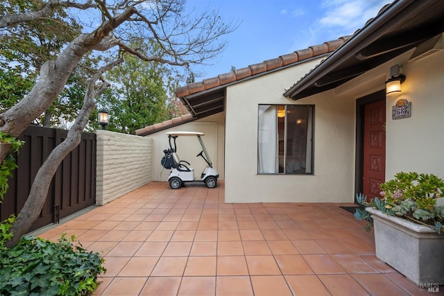 view of patio / terrace featuring fence