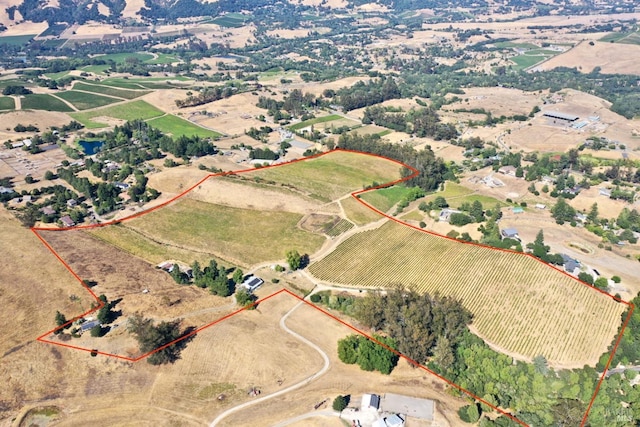 bird's eye view with a rural view