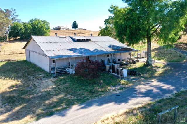 view of front of property featuring metal roof