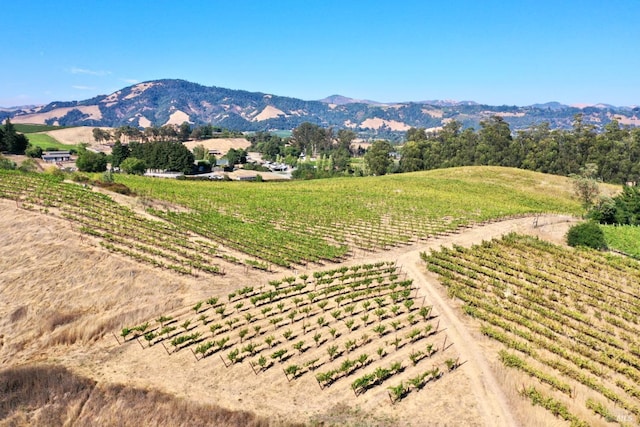 exterior space with a rural view and a mountain view