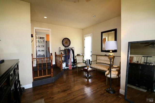 interior space featuring recessed lighting, wood finished floors, and baseboards