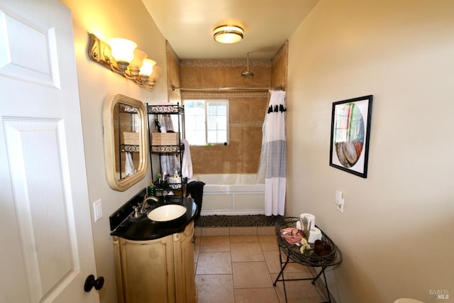 bathroom with shower / bath combo, vanity, and tile patterned floors