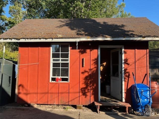 exterior space with an outbuilding