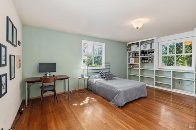 bedroom featuring wood-type flooring