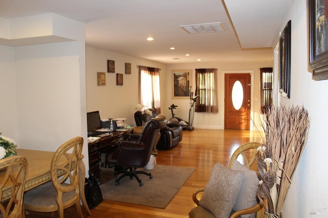 office space with light hardwood / wood-style flooring