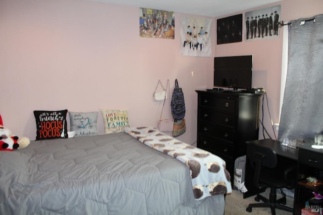 bedroom featuring carpet